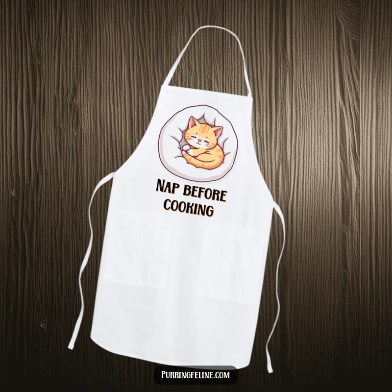 Funny cat apron featuring a serene cat sleeping soundly in a bed, perfect for adding a peaceful vibe to the kitchen.