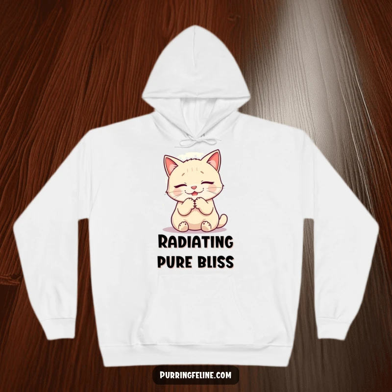 Funny hoodie depicting a purring cat with a warm glow, offering cozy serenity and humor.