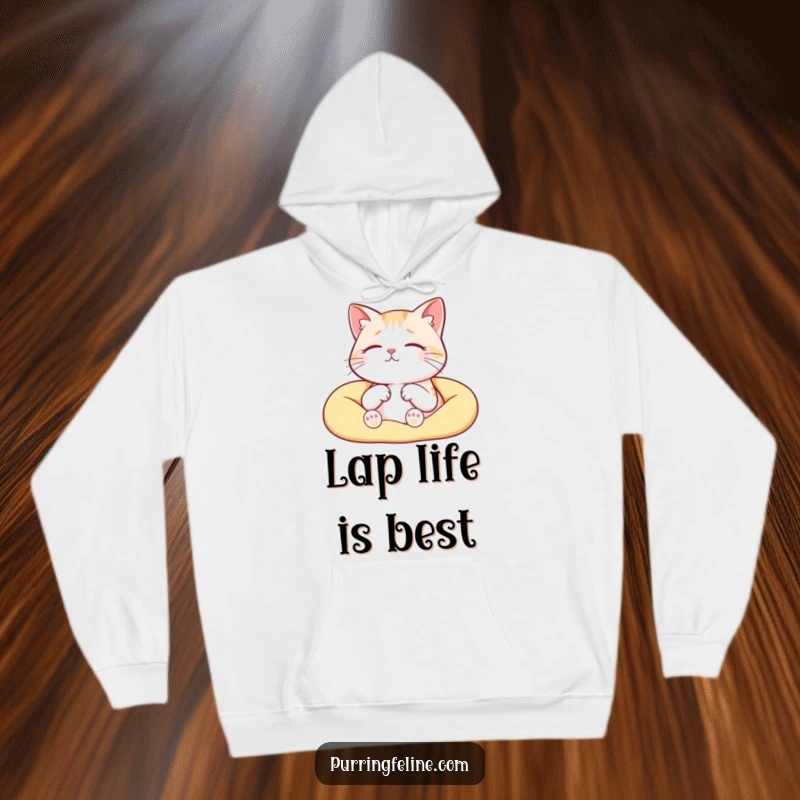 Funny serene cat hoodie, a cat blissfully purring in a warm lap, embodied comfort and humorous coziness.