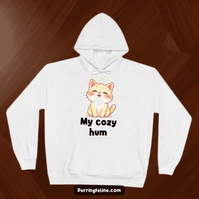 Funny Hoodie: A purring cat radiating warmth through its gentle hum, symbolizing comfort and loving energy.