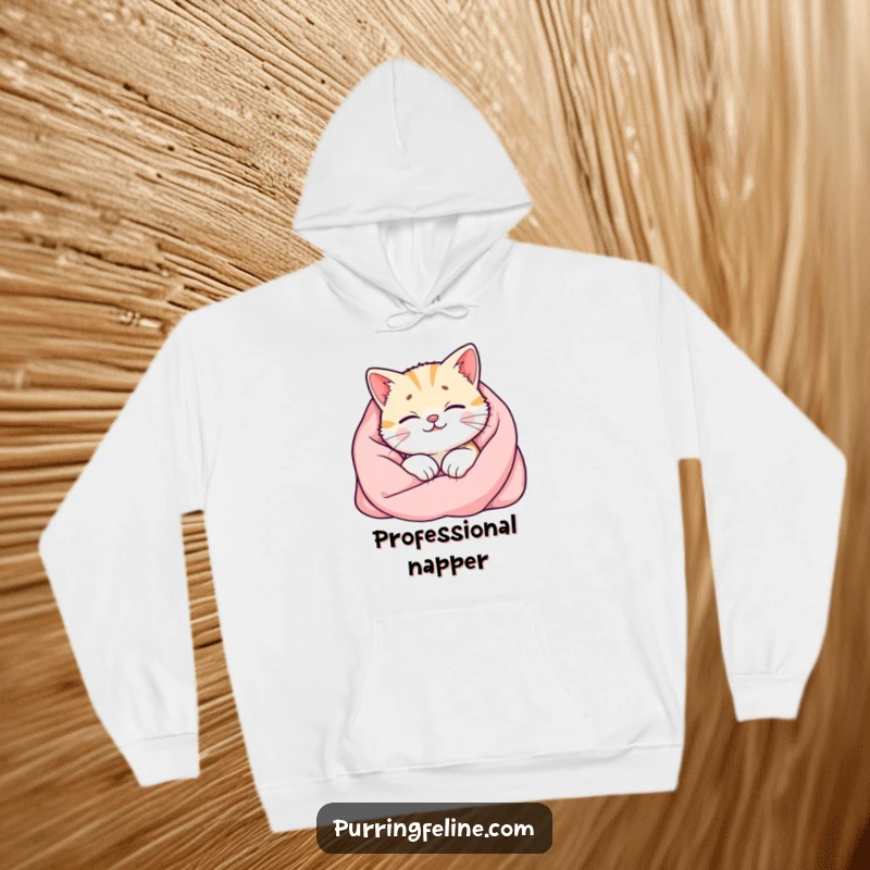 Funny cat hoodie showing a happy cat in a soft blanket, with its purr radiating as a visible warm glow, ideal for ultimate snugness.