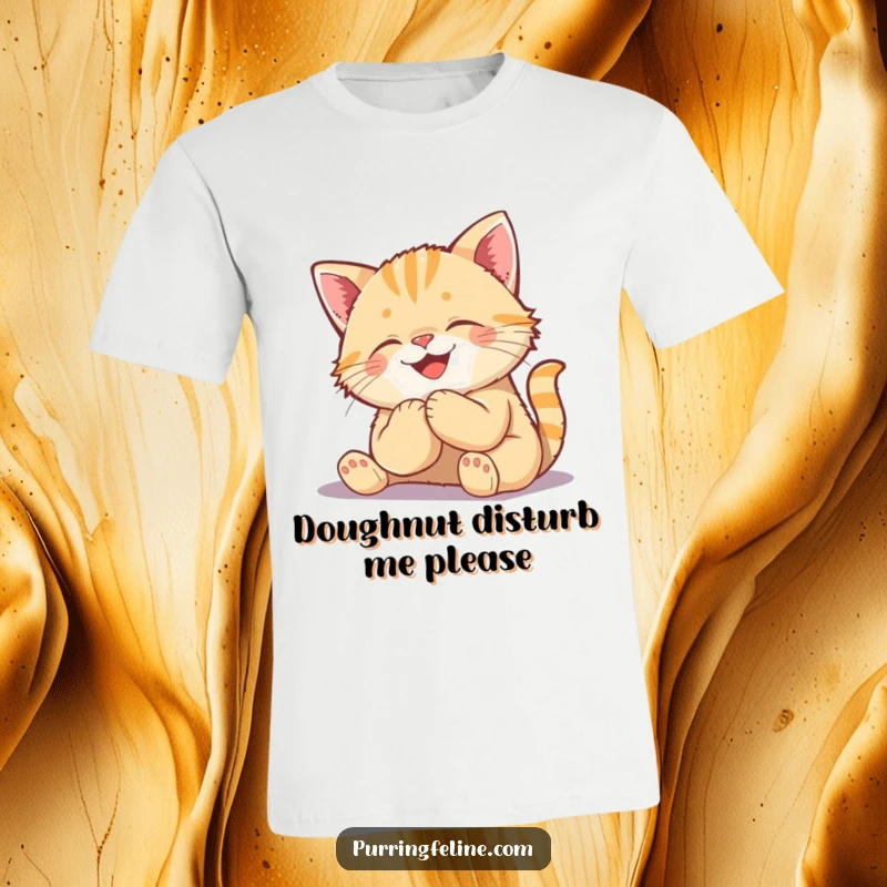Funny Kneading Cat Cub T-Shirt - a cheerful kitten intensely focused on making biscuits, showcasing pure feline delight.