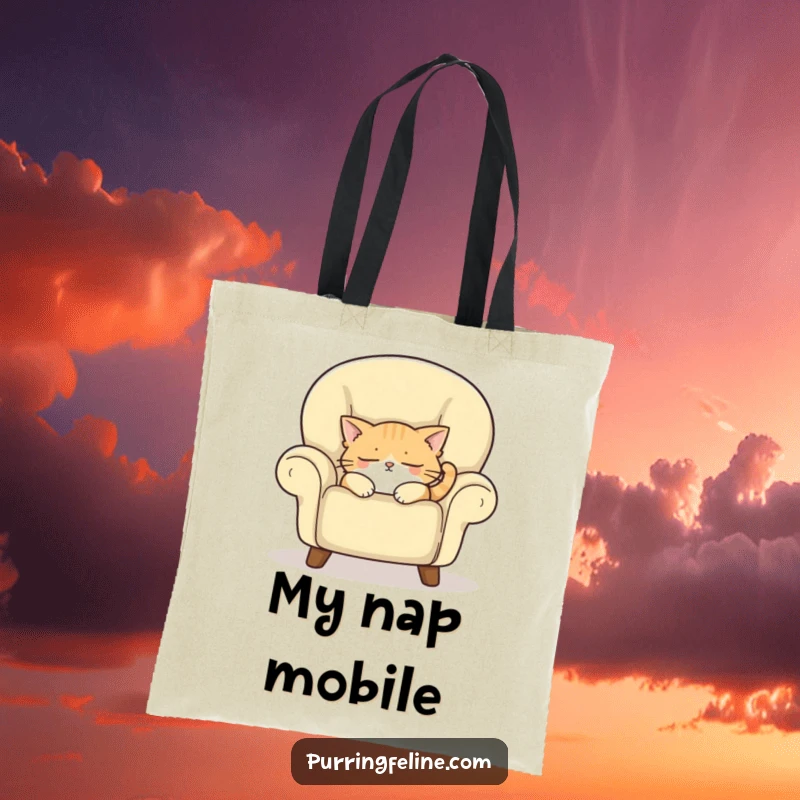 Funny tote bag featuring a sleepy cat napping in a cozy armchair, perfect for carrying books or groceries with a humorous touch.